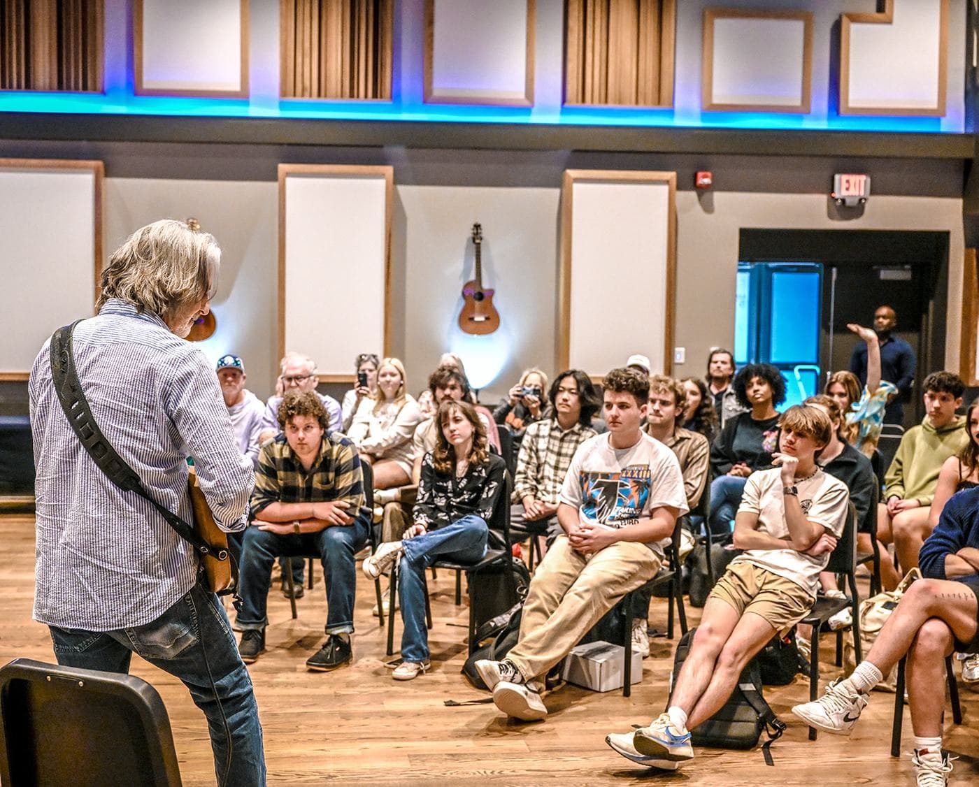 Guitarist Allen Hinds playing for a room of music students at Lucky Man Studio, Auburn University