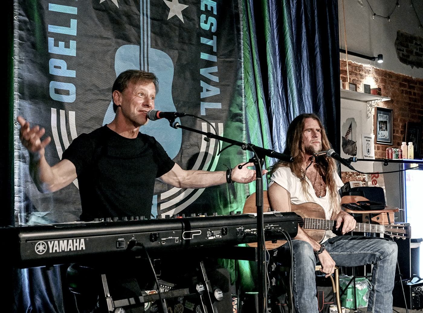 Pete Muller at the keys beside Grayson Capps