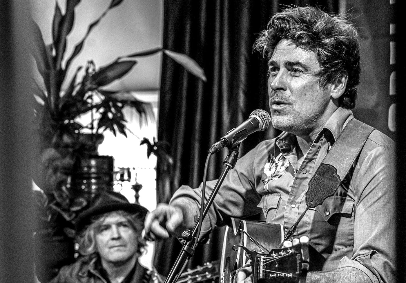 Tim Easton and Eliot Bronson performing together, in black and white