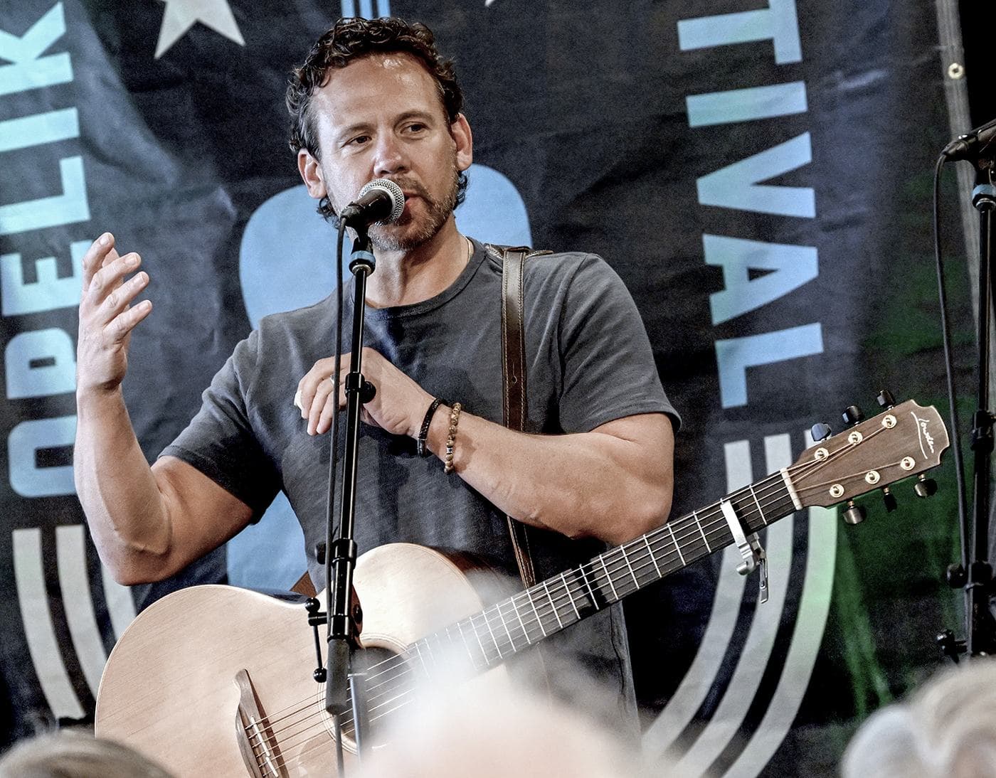 Mike Kinnebrew playing a morning set at Market Street Coffee during OSF7