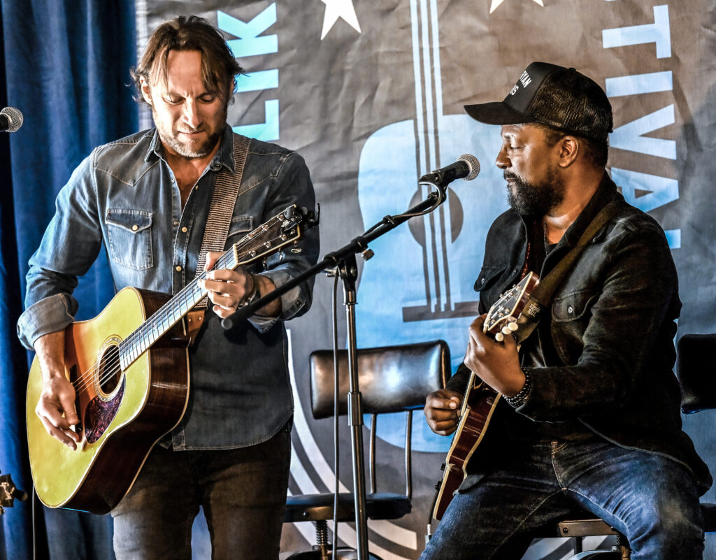 OPELIKA, ALABAMA - OCTOBER 08: Chris Stills and David Ryan Harris perform at Resting Pulse Brewery during the 2023 Opelika Songwriters Festival on October 08, 2023, in Opelika, Alabama. (Photo by R. Diamond/Getty Images)