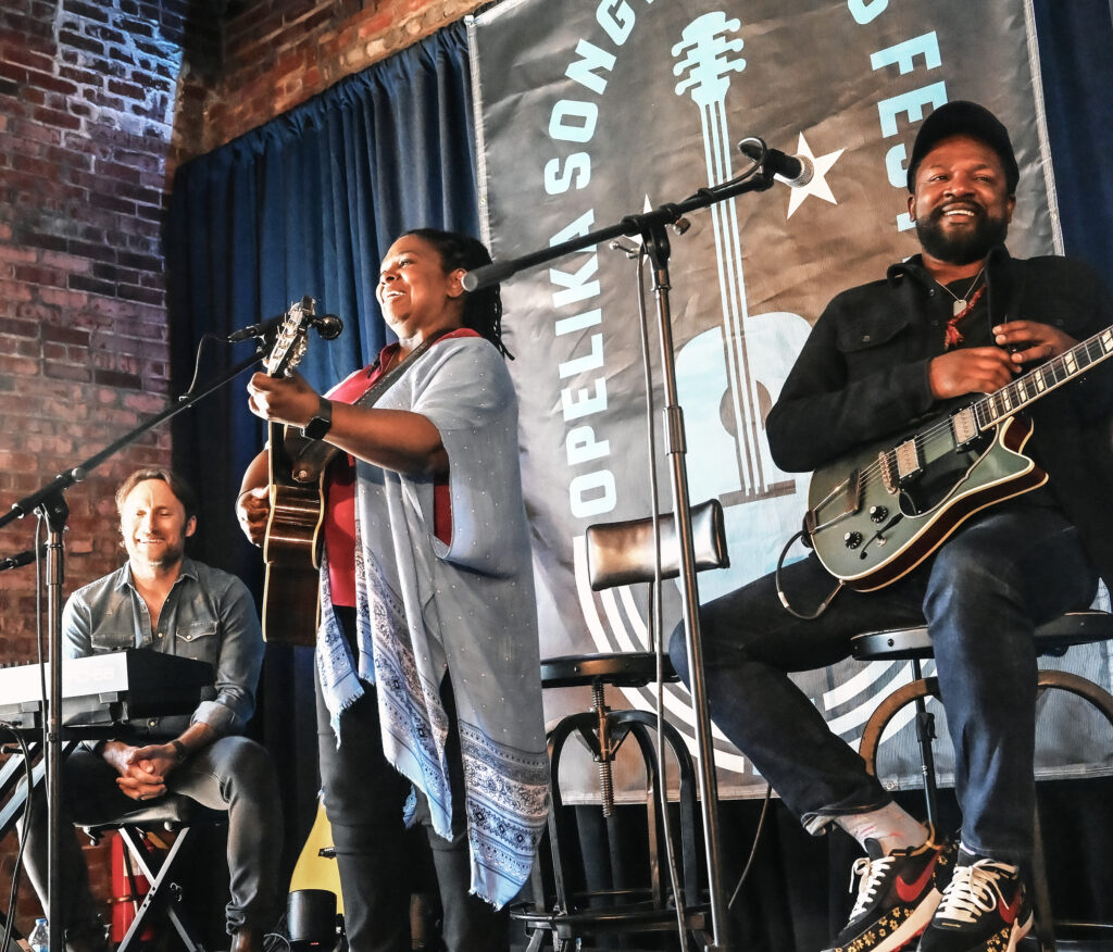 OPELIKA, ALABAMA - OCTOBER 08: Chris Stills, Ruthie Foster and David Ryan Harris perform at Resting Pulse Brewery during the 2023 Opelika Songwriters Festival on October 08, 2023, in Opelika, Alabama. (Photo by R. Diamond/Getty Images)
